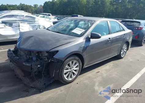 2014 Toyota Camry Hybrid Xle z USA, uszkodzony, nr VIN 4T1BD1FK7EU101964